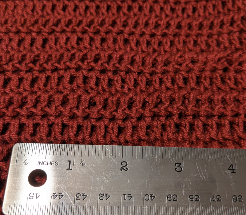 Stitch gauge of my chosen crochet stitch with a metal ruler